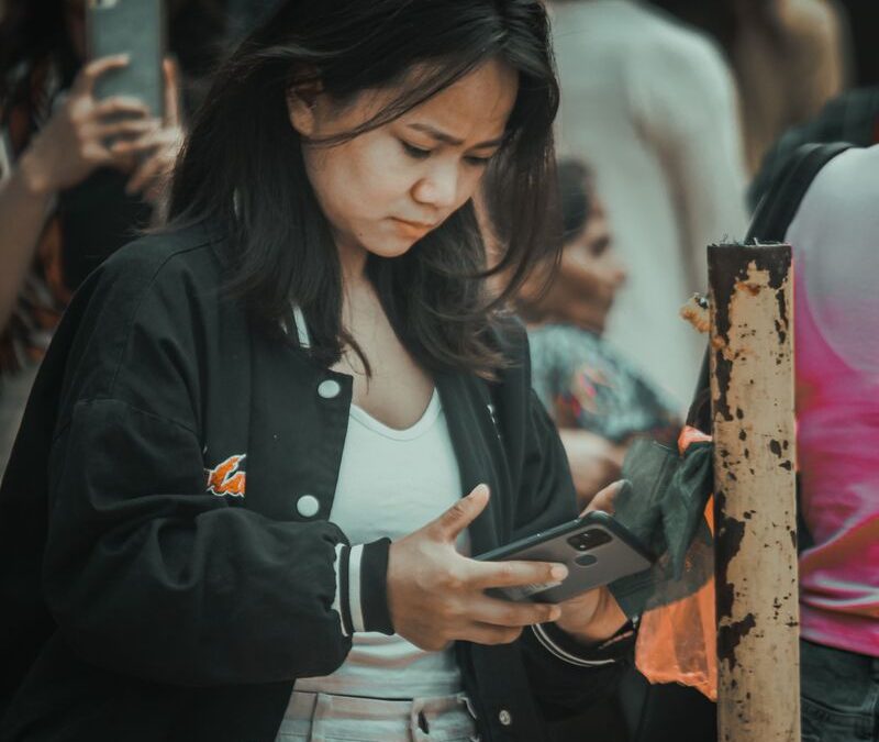 woman frustrated with slow website UX design on phone